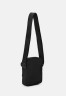Tommy Hilfiger HORIZON MINI REPORTER Across body bag black HORIZON MINI REPORTER Сумка через плечо черный