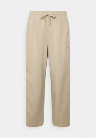 Tommy Hilfiger RELAXED INTERLOCKPANT Tracksuit bottoms beige RELAXED INTERLOCKPANT Спортивные штаны бежевый
