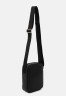 Tommy Hilfiger CENTRAL MINI REPORTER Across body bag black CENTRAL MINI REPORTER Сумка через плечо черный
