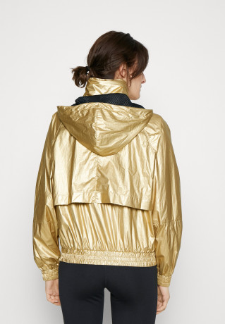 Tommy Hilfiger RELAXED SAILING JACKET Training jacket gold-coloured RELAXED SAILING JACKET Тренировочная куртка золотого цвета