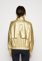 Tommy Hilfiger RELAXED SAILING JACKET Training jacket gold-coloured RELAXED SAILING JACKET Тренировочная куртка золотого цвета