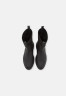 Tommy Hilfiger FEMININE SEASONAL UTILITY Platform ankle boots black FEMININE SEASONAL UTILITY Ботильоны на платформе черный