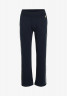 Tommy Hilfiger TAPE HIGH RISE JOGGERS Tracksuit bottoms desert sky ДЖОГГЕРЫ С ВЫСОКОЙ ПОСАДКОЙ TAPE Спортивные брюки небо пустыни