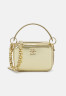 Tommy Hilfiger CHIC TRUNK Across body bag gold CHIC TRUNK Сумка через плечо золото