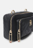 Tommy Hilfiger ICONIC CAMERA BAG Across body bag space blue ICONIC CAMERA BAG Сумка через плечо космический синий