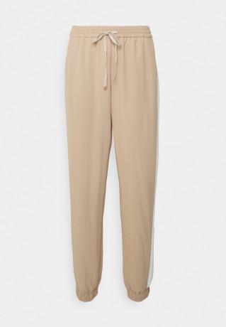 Tommy Hilfiger FLUID JOGGER PANT Tracksuit bottoms beige / ecru  FLUID JOGGER PANT Спортивные штаны бежевый / экрю