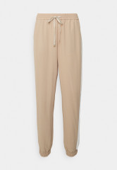 Tommy Hilfiger FLUID JOGGER PANT Tracksuit bottoms beige / ecru  FLUID JOGGER PANT Спортивные штаны бежевый / экрю