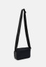 Tommy Hilfiger CITY COMMUTER  Across body bag space blue CITY COMMUTER Сумка через плечо космический синий