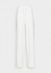 Tommy Hilfiger FLEX WIDE LEG PANT Tracksuit bottoms ecru FLEX WIDE LEG PANT Брюки от спортивного костюма экрю