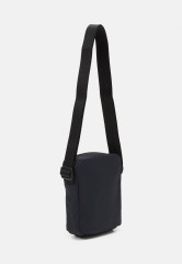 Tommy Hilfiger HILFIGER MINI REPORTER Across body bag space blue HILFIGER MINI REPORTER Сумка через плечо космический синий
