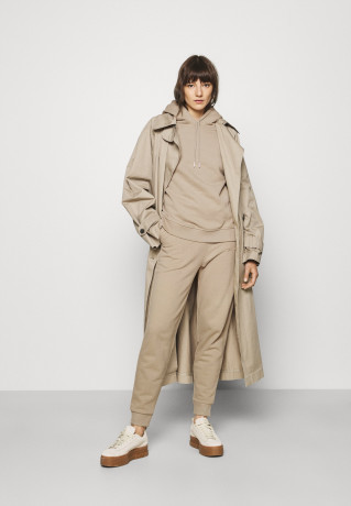 Tommy Hilfiger REGULAR SCRIPT  Tracksuit bottoms beige ОБЫЧНЫЙ СЦЕНАРИЙ Низ спортивного костюма бежевый