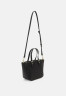 Tommy Hilfiger TIMELESS SMALL TOTE QUILTED Handbag black TIMELESS SMALL TOTE SQUILTED Сумка черный
