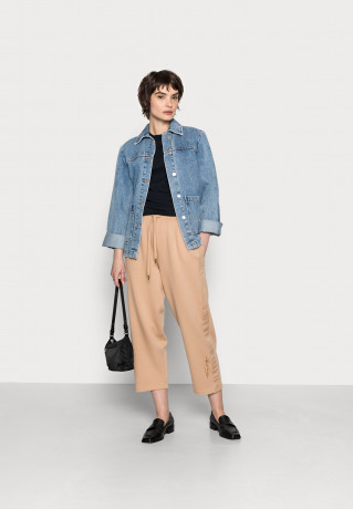 Tommy Hilfiger RELAXED LONG PANT Tracksuit bottoms beige RELAXED LONG PANT Спортивные штаны бежевый