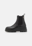 Tommy Hilfiger MONOCHROMATIC CHELSEA BOOT Platform ankle boots black MONOCHROMATIC CHELSEA BOOT Ботильоны на платформе черный