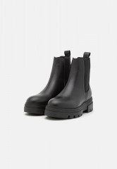 Tommy Hilfiger MONOCHROMATIC CHELSEA BOOT Platform ankle boots black MONOCHROMATIC CHELSEA BOOT Ботильоны на платформе черный