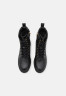 Tommy Hilfiger LACE UP ZIP BOOT MONOGRAM Platform ankle boots black LACE UP ZIP BOOT MONOGRAM Ботильоны на платформе черный