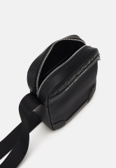 Tommy Hilfiger CENTRAL REPORTER UNISEX Across body bag black CENTRAL REPORTER UNISEX Сумка через плечо черный