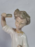 Статуэтка винтажная Liadro "Мальчик с расческой", ручная работа, фарфор, 21 см, Испания, 1970-80гг.