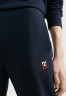 Tommy Hilfiger TAPERED MONOGRAM  Tracksuit bottoms desert sky TAPERED MONOGRAM Спортивные брюки небо пустыни