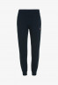 Tommy Hilfiger TAPERED MONOGRAM  Tracksuit bottoms desert sky TAPERED MONOGRAM Спортивные брюки небо пустыни