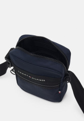 Tommy Hilfiger HORIZON MINI REPORTER UNISEX Across body bag space blue HORIZON MINI REPORTER UNISEX Сумка через плечо космический синий