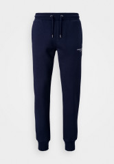 Tommy Hilfiger LOGO SWEATPANTS UNISEX Tracksuit bottoms desert sky СПОРТИВНЫЕ БРЮКИ С ЛОГОТИПОМ УНИСЕКС Спортивные штаны небо пустыни