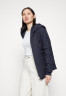 Tommy Hilfiger SORONA QUILTED JACKET Light jacket desert sky СТЕГАНАЯ КУРТКА SORONA Легкая куртка небо пустыни