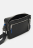 Tommy Hilfiger TH BUSINESS LEATHER CAMERA BAG Across body bag black TH BUSINESS LEATHER CAMERA BAG Сумка через плечо черный