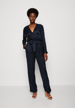 Tommy Hilfiger Jumpsuit tonal monogram jacquard/desert sky комбинезон жаккард с монограммой в тон/небо пустыни
