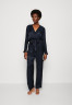 Tommy Hilfiger Jumpsuit tonal monogram jacquard/desert sky комбинезон жаккард с монограммой в тон/небо пустыни
