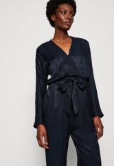 Tommy Hilfiger Jumpsuit tonal monogram jacquard/desert sky комбинезон жаккард с монограммой в тон/небо пустыни