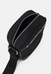 Tommy Hilfiger CENTRAL REPREVE MINI REPORTER UNISEX Across body bag black CENTRAL REPREVE MINI REPORTER UNISEX Сумка через плечо черный