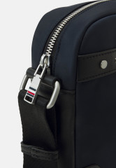 Tommy Hilfiger CENTRAL REPREVE MINI REPORTER UNISEX Across body bag space blue CENTRAL REPREVE MINI REPORTER UNISEX Сумка через плечо космический синий