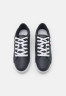 Tommy Hilfiger ESSENTIAL WEBBING CUPSOLE Trainers space blue ESSENTIAL WEBBING CUPSOLE — Кроссовки космический синий