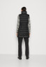 Tommy Hilfiger PADDED GLOBAL LONG VEST Waistcoat black PADDED GLOBAL LONG VEST Жилет черный