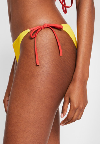 Tommy Hilfiger TOMMY HILFIGER X ANDY WAHOL STRING SIDE TIE Bikini bottoms warhol sunset TOMMY HILFIGER X ANDY WAHOL STRING SIDE TIE Плавки бикини Уорхол закат