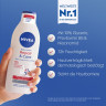 NIVEA Body Lotion Repair & Care, 400 ml, Нивеа Лосьон для тела, 10% глицерин, провитамин B5 и ниацинамид, для очень сухой кожи, 72ч увлажнение, 400 мл