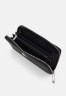 Tommy Hilfiger EMBLEM LARGE Wallet black ЭМБЛЕМА БОЛЬШАЯ Бумажник черный