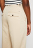 Tommy Hilfiger TAPERED PANT Trousers classic beige ЗАЖИМНЫЕ БРЮКИ Брюки классический бежевый