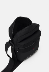 Tommy Hilfiger SKYLINE MINI REPORTER UNISEX Across body bag black SKYLINE MINI REPORTER UNISEX Сумка через плечо черный